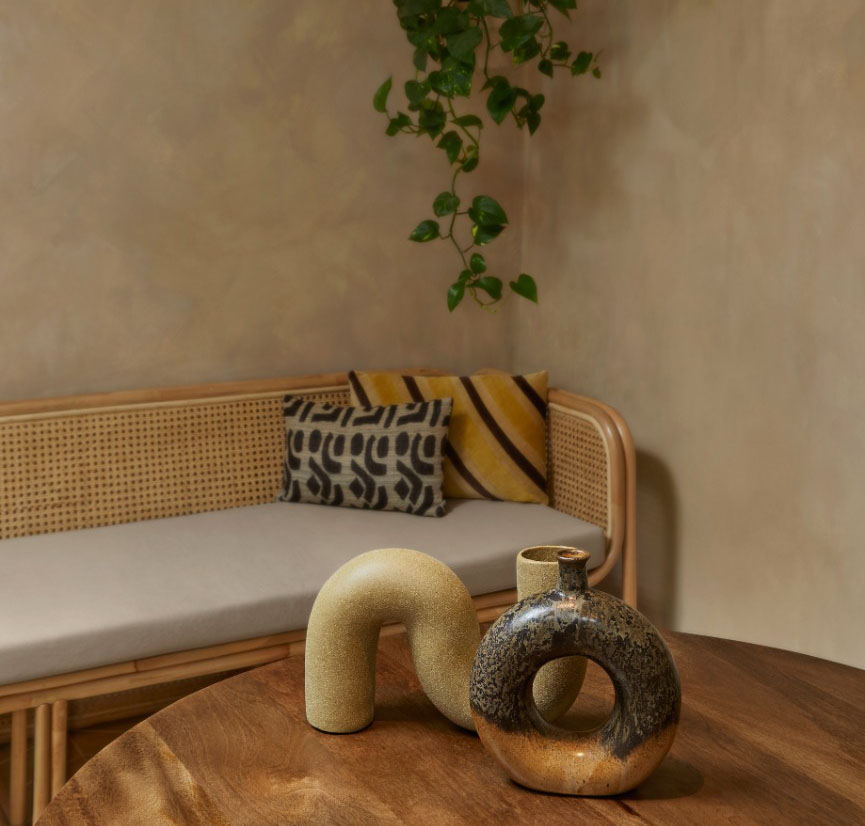 house spa interior design bromley london hanging plants ceramic vases cane bench dining table