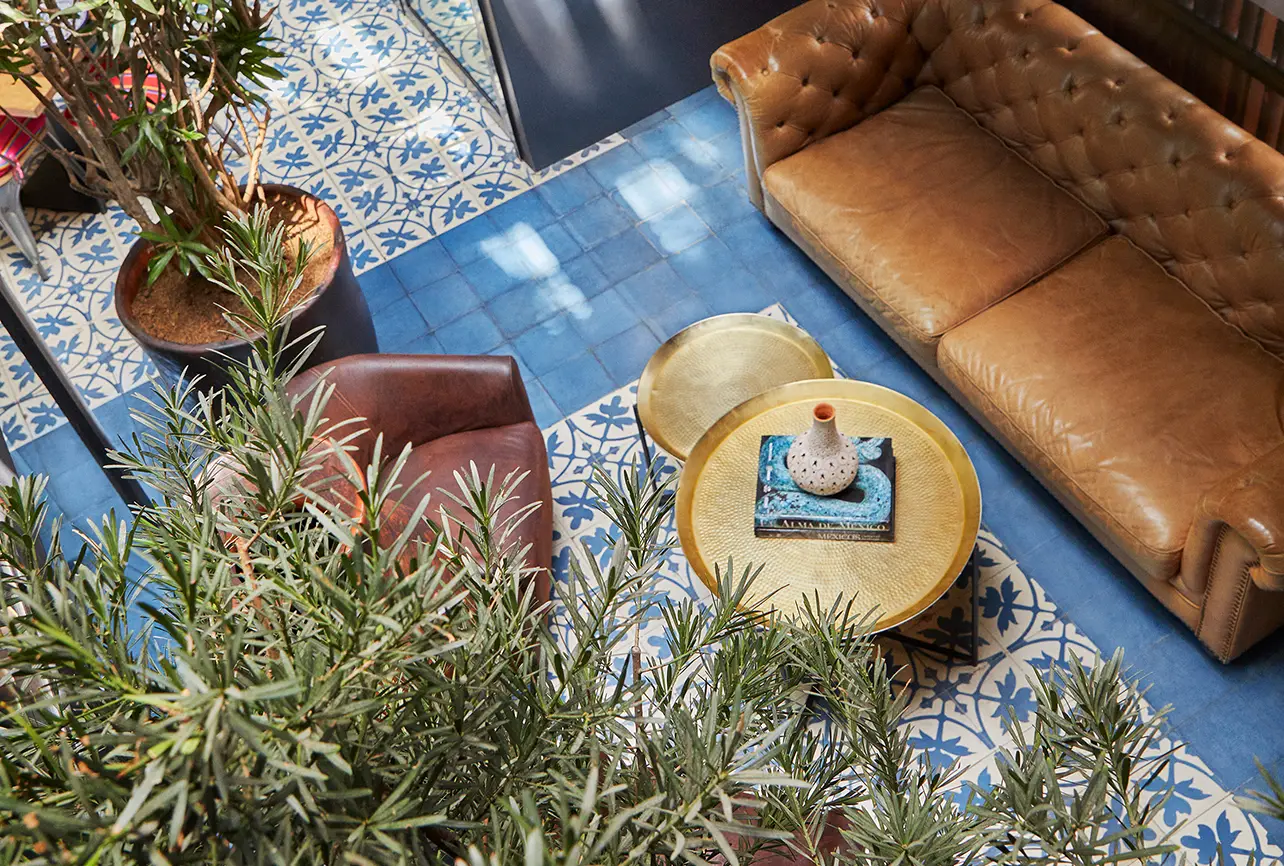 cantina lounge interior design london virgin of guadalupe mural leather sofa