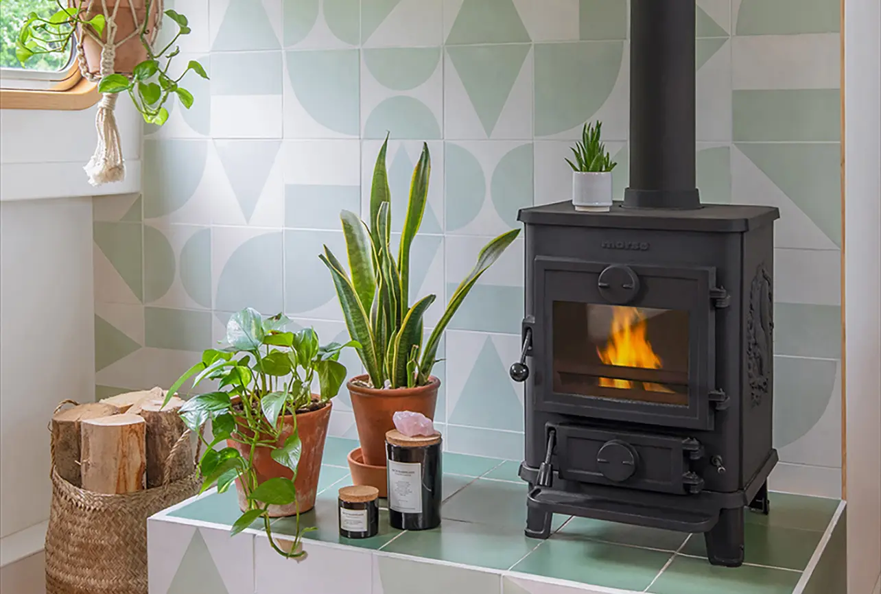 house boat interior design london 03 wood burning stove green tiles