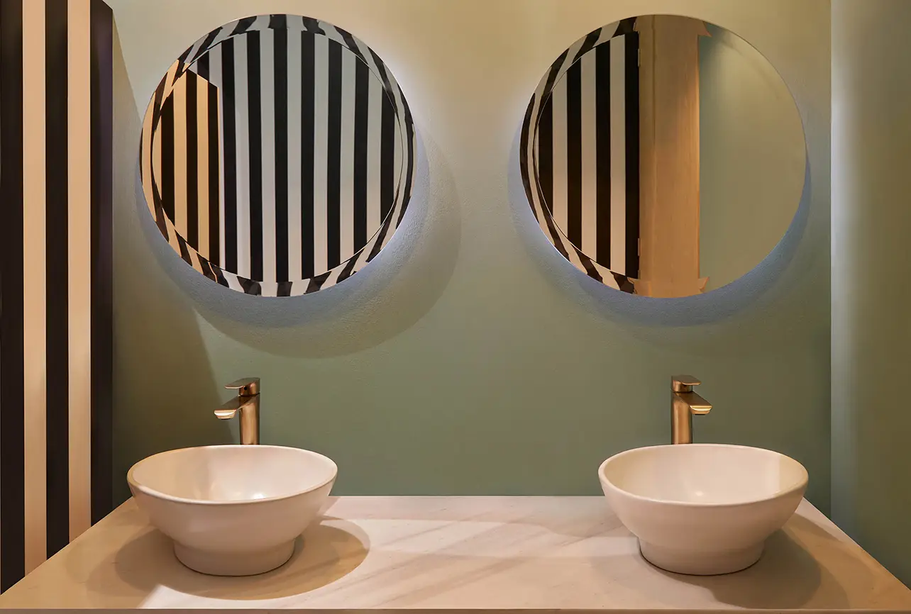 italian restaurant restroom interior design london round mirrors twin sinks
