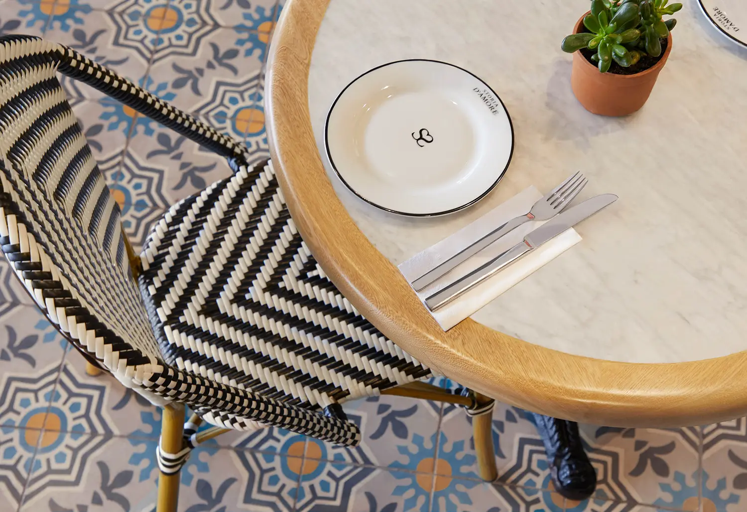 italian restaurant tabletop interior design london woven bistro chair place setting