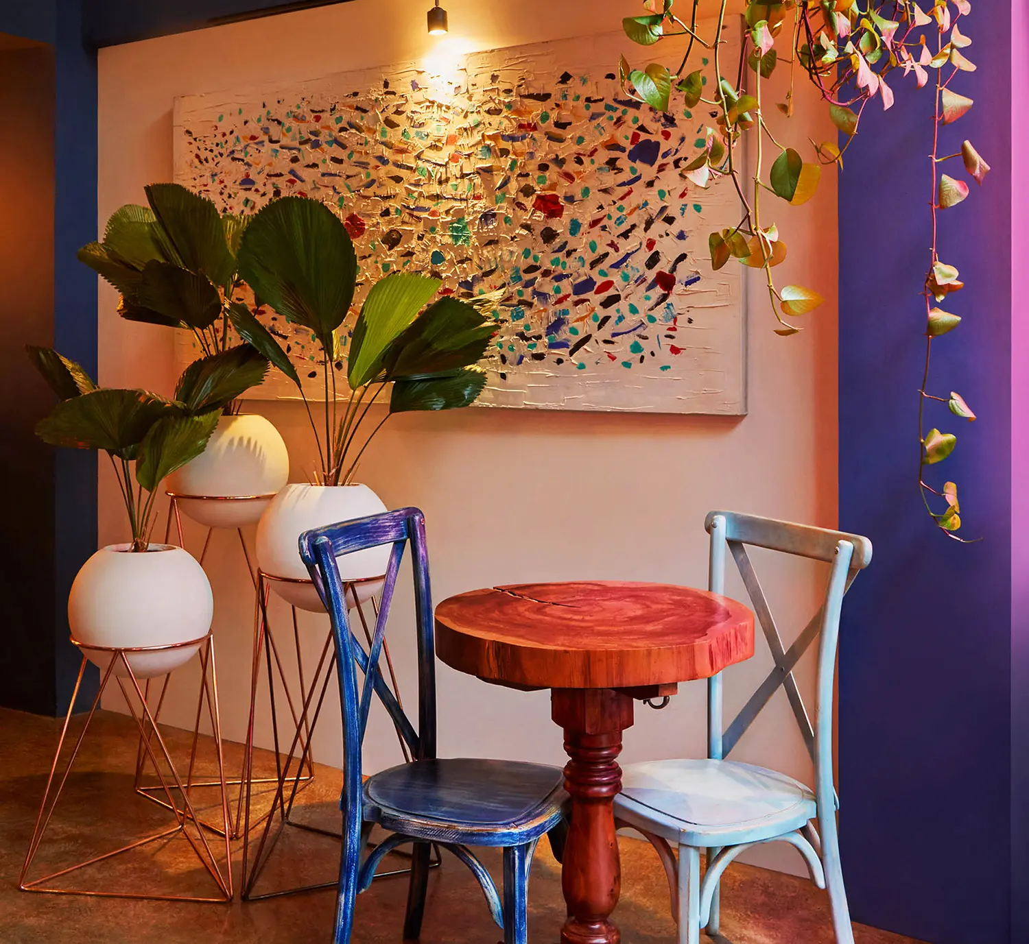 restaurant cozy corner table plants abstract art london