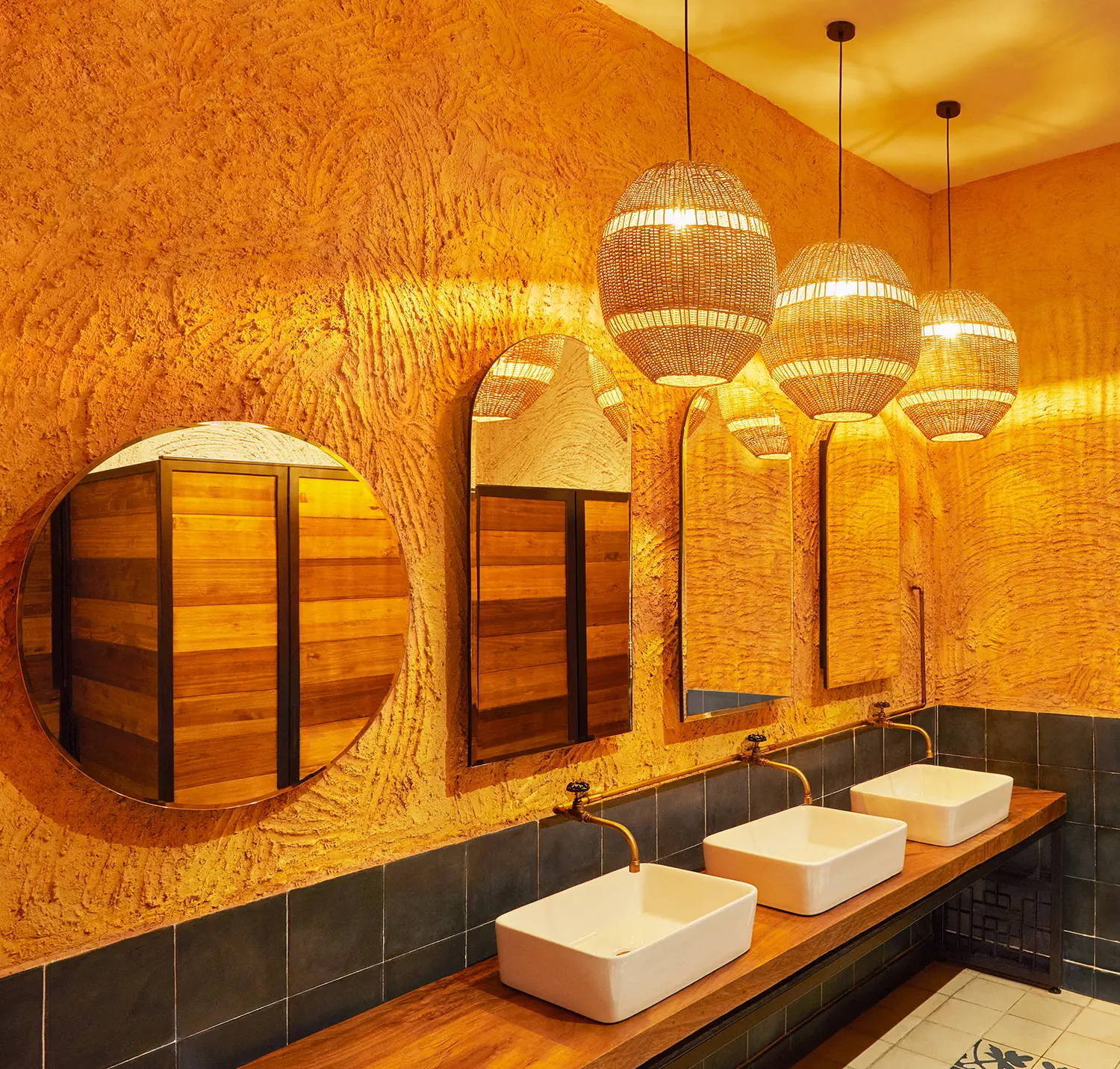 restaurant washroom interior design london rattan pendant lanterns arched mirrors
